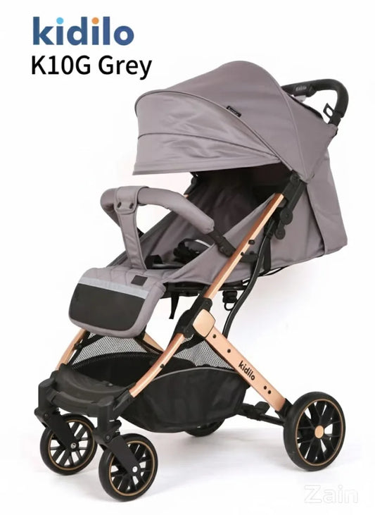 Gray and rose gold stroller with 'kidilo' branding on a white background
