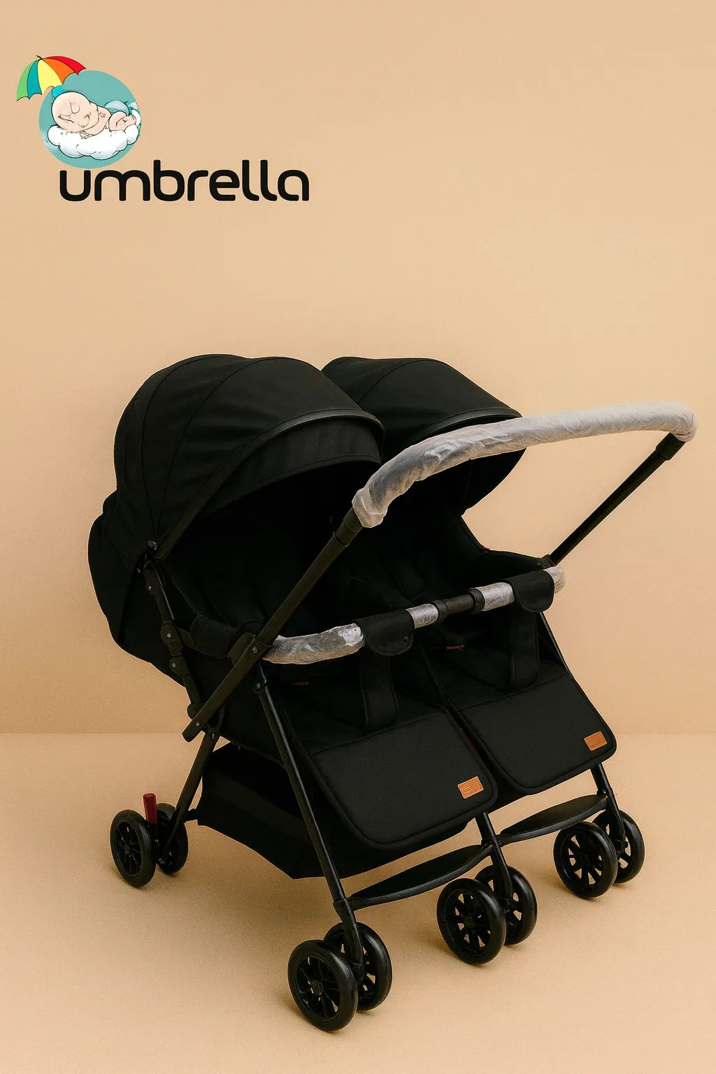 Black baby stroller with silver handle on a beige background, featuring the Umbrella brand logo.